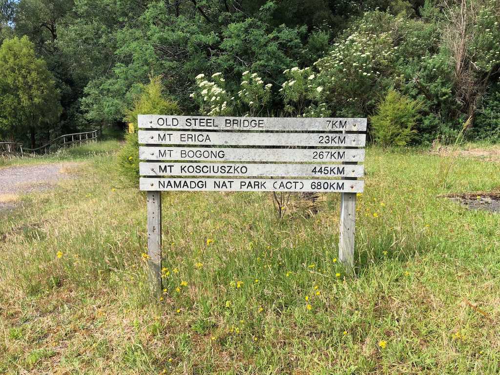 Signpost with distances for locations on the Australian Alps Walking Track