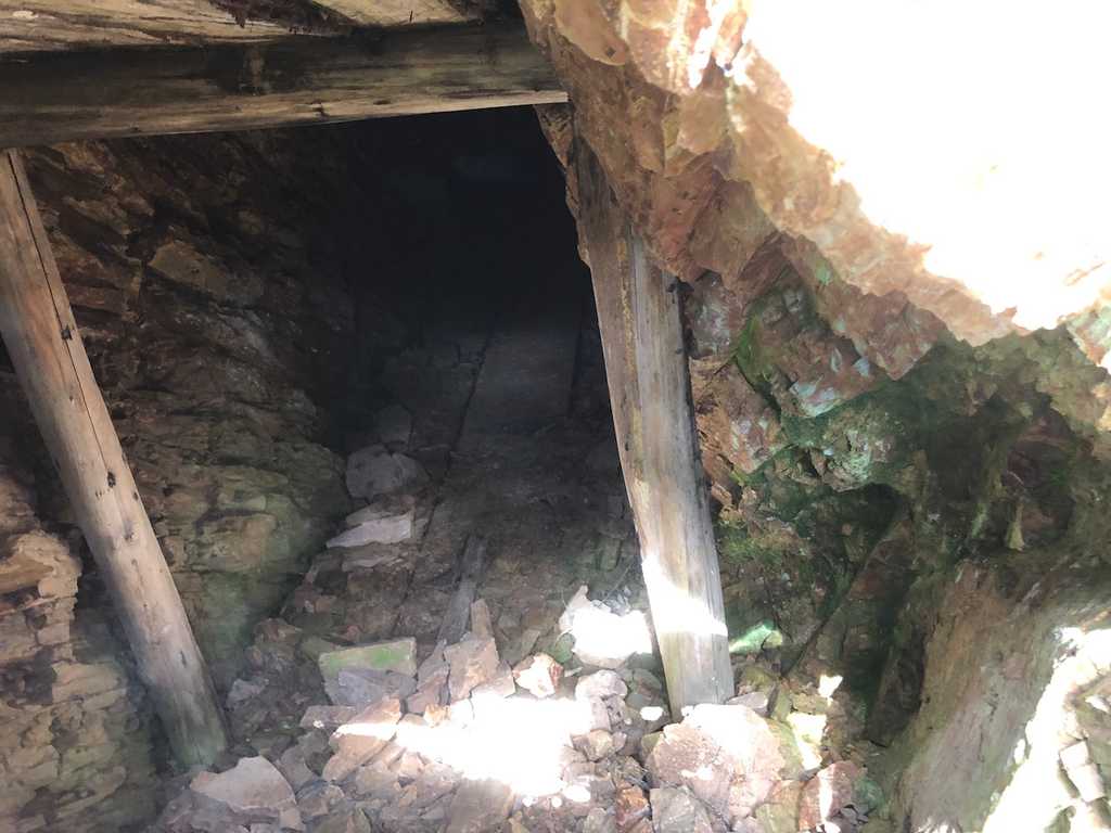 A blocked off mine shaft entrance